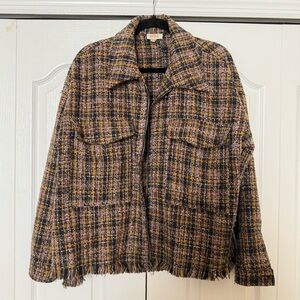 Woman’s jacket featuring Plaid Design